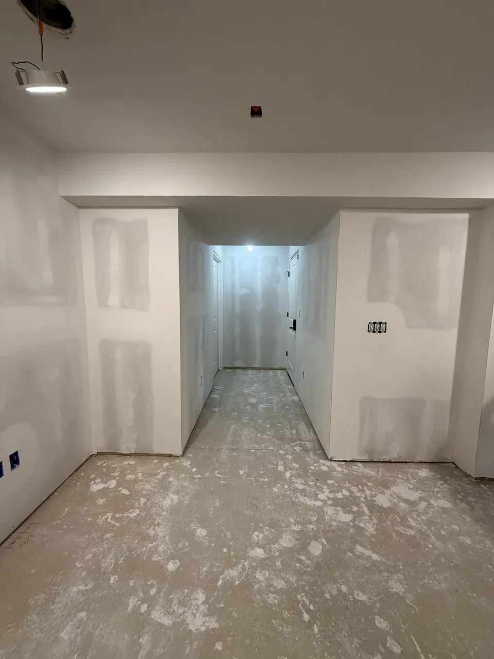 Basement doorway and coated drywall joints